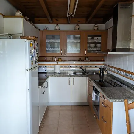 Casa Luisa Biedes, Pilona 인피스토
